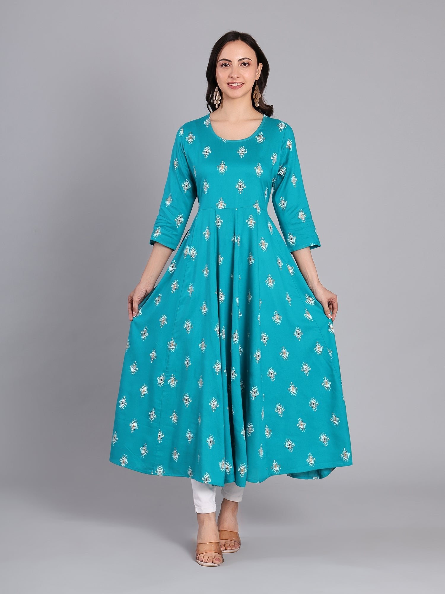 Grace in Every Step – Stunning Turquoise Print Kurta for Effortless Elegance Women's Kurti - Monterowindia