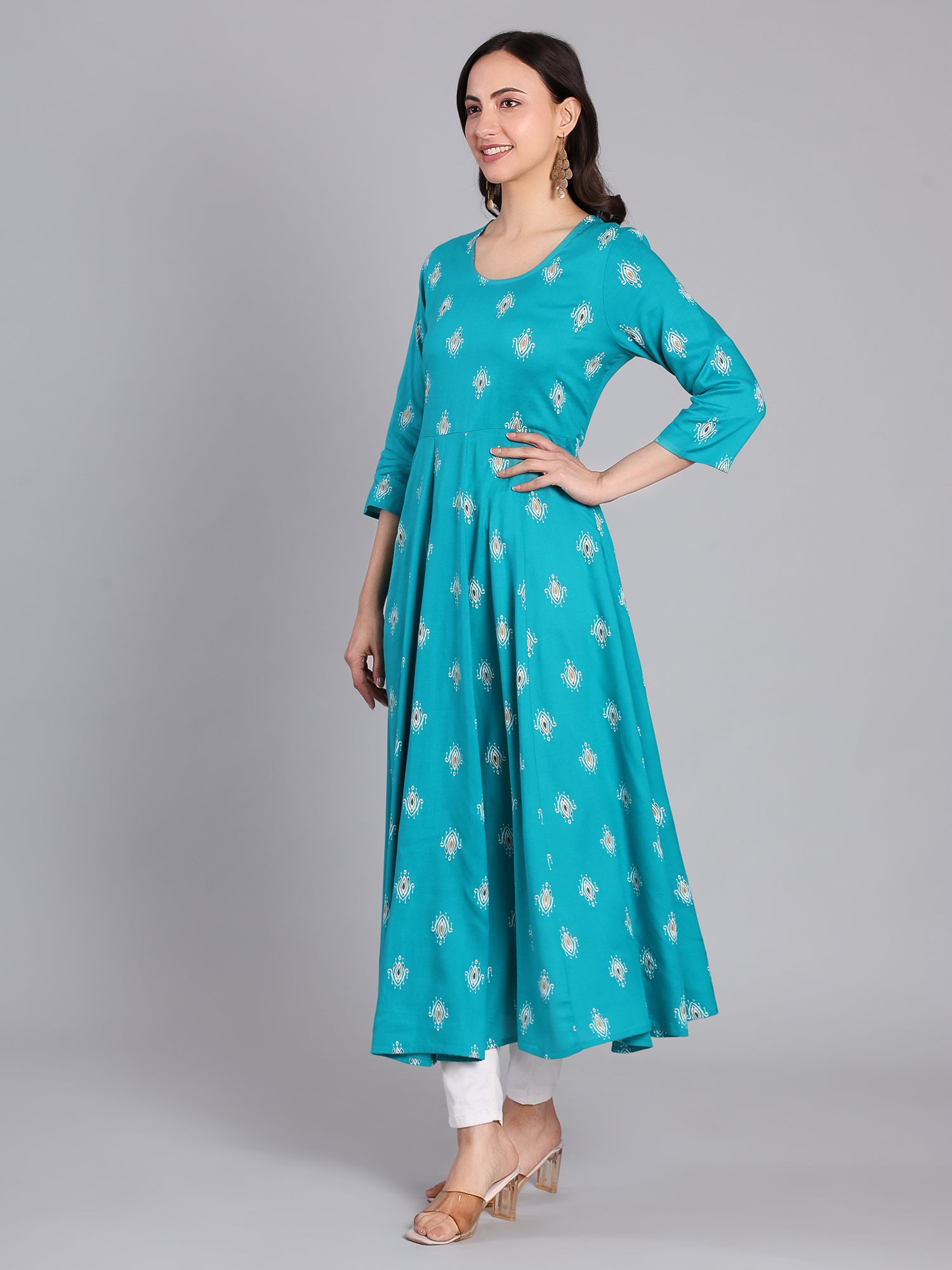 Grace in Every Step – Stunning Turquoise Print Kurta for Effortless Elegance Women's Kurti - Monterowindia