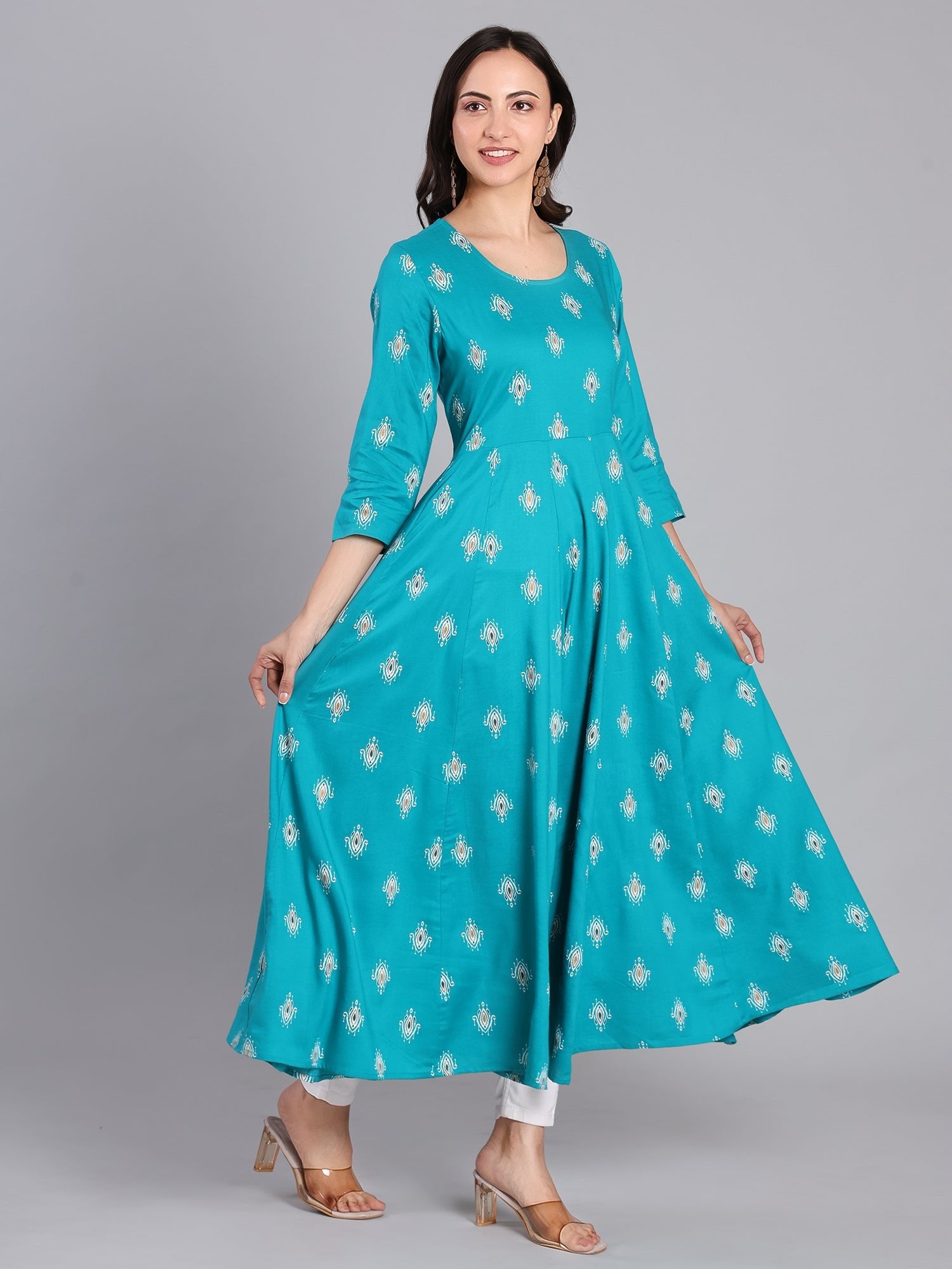 Grace in Every Step – Stunning Turquoise Print Kurta for Effortless Elegance Women's Kurti - Monterowindia